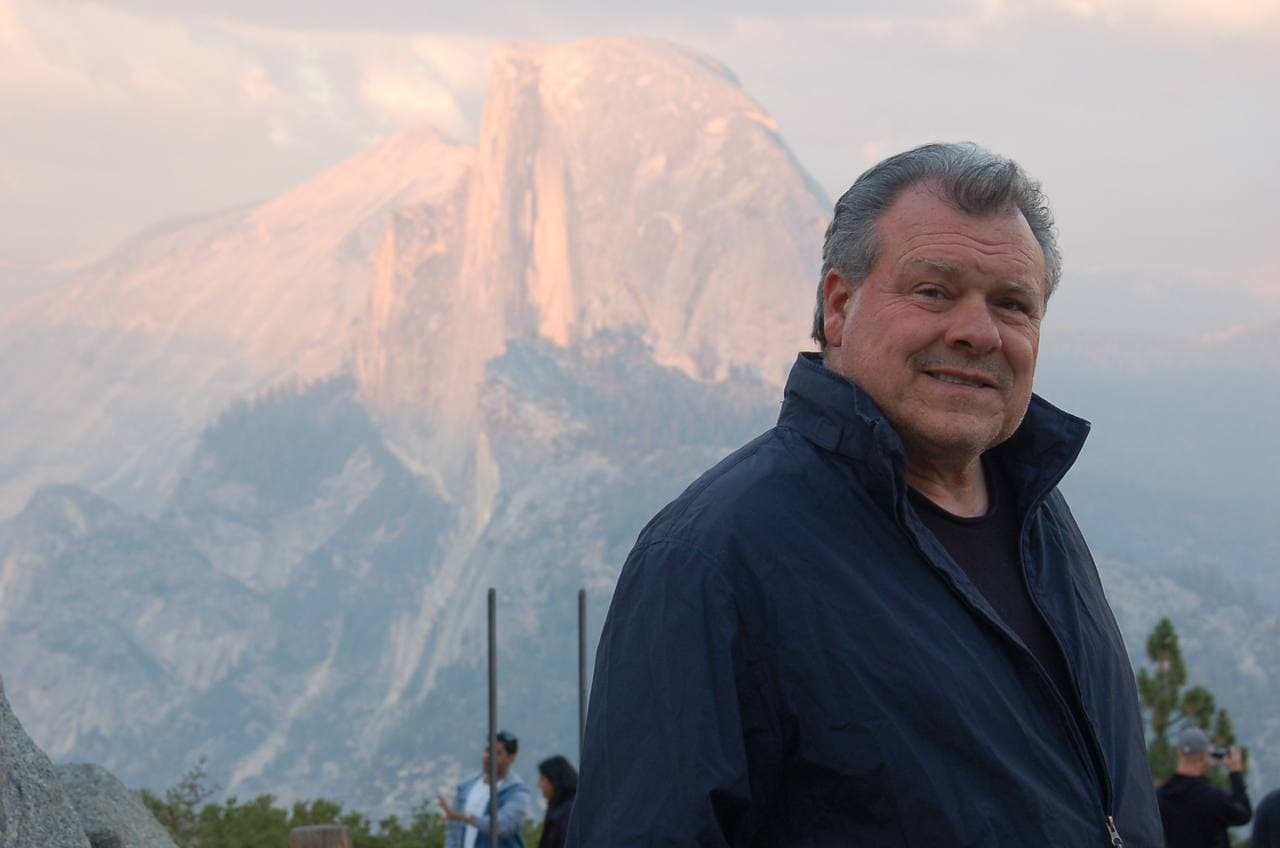 Anthony Agnello outdoors, with Half Dome in the background.